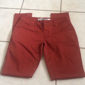 Rusty red skinny jeans